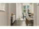 Bright dining area featuring wood floors, a large window, and a stylish dining set at 1431 Porchfield Dr., Conway, SC 29526