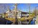 Charming riverfront building with a spacious porch, surrounded by lush greenery and reflecting on the water at 1431 Porchfield Dr., Conway, SC 29526