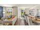 Open-concept living space with hardwood floors connecting kitchen, living room and dining area at 1431 Porchfield Dr., Conway, SC 29526