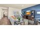 Spacious living room with an open floor plan, modern furnishings, and lots of natural light at 1431 Porchfield Dr., Conway, SC 29526