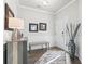 Welcoming foyer featuring wood floors, neutral paint, bench, and decorative accents at 145 Copper Leaf Dr., Myrtle Beach, SC 29588