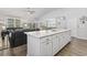 Open kitchen island featuring white cabinets and stone countertops at 145 Copper Leaf Dr., Myrtle Beach, SC 29588