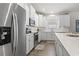 Bright kitchen with white cabinets, stainless steel appliances and stone countertops at 145 Copper Leaf Dr., Myrtle Beach, SC 29588