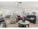 Open-concept living room, dining room, and kitchen combination with vaulted ceilings at 145 Copper Leaf Dr., Myrtle Beach, SC 29588