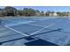 Well-maintained blue tennis courts with visible nets, perfect for recreational play in a community at 145 Copper Leaf Dr., Myrtle Beach, SC 29588