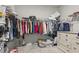 Walk-in closet with ample hanging space, shelving, and a built-in dresser for organized storage at 145 Copper Leaf Dr., Myrtle Beach, SC 29588