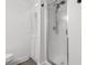 Bathroom featuring a glass shower with frosted doors and a linen closet at 1500 Cenith Dr. # C-103, North Myrtle Beach, SC 29582