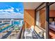 Enjoy the view from this balcony with a chair and view of the city and waterpark at 1501 S Ocean Blvd. # 1406, Myrtle Beach, SC 29577