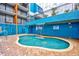 Relaxing hot tub with a small waterfall feature and blue siding at 1501 S Ocean Blvd. # 1406, Myrtle Beach, SC 29577