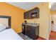 A convenient kitchenette featuring a microwave, sink, and mini-fridge at 1501 S Ocean Blvd. # 1406, Myrtle Beach, SC 29577