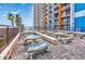 Outdoor patio with mosaic tables and seating, perfect for relaxing at 1501 S Ocean Blvd. # 1406, Myrtle Beach, SC 29577