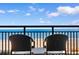 Relax on this balcony with chairs and enjoy the view of the ocean and beach at 1501 S Ocean Blvd. # 633, Myrtle Beach, SC 29577