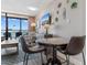 Cozy dining area featuring a small table, chairs, and coastal decorations at 1501 S Ocean Blvd. # 633, Myrtle Beach, SC 29577