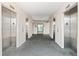 A clean and modern elevator bay features four stainless steel elevators for easy access to all floors at 1501 S Ocean Blvd. # 633, Myrtle Beach, SC 29577