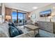 Comfortable living room featuring ocean views, neutral colors, and balcony access at 1501 S Ocean Blvd. # 633, Myrtle Beach, SC 29577