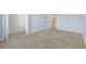 Bedroom with neutral walls and carpet, white trim, and a closet with folding doors at 160 Lazy Willow Ln. # 204, Myrtle Beach, SC 29577