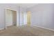 Small bedroom with neutral carpet and walls, closet and white door to hall at 160 Lazy Willow Ln. # 204, Myrtle Beach, SC 29577