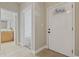 Well-lit hallway shows the front door, bathroom entrance, and bedroom access at 160 Lazy Willow Ln. # 204, Myrtle Beach, SC 29577
