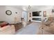 Bright living room featuring a modern fireplace, large television, and comfortable seating at 1608 25Th Ave. N, North Myrtle Beach, SC 29582