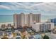 Aerial view of two beachfront condo towers, showcasing architecture, beach access, and nearby street at 1625 S Ocean Blvd. # 1004, North Myrtle Beach, SC 29582