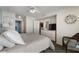 Comfortable bedroom with a queen-sized bed, dresser, and a glimpse into the ensuite bathroom at 1625 S Ocean Blvd. # 1004, North Myrtle Beach, SC 29582