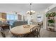 Dining area that opens to the living room, bedroom, and balcony with amazing water views at 1625 S Ocean Blvd. # 1004, North Myrtle Beach, SC 29582