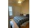 Cozy bedroom with a double bed, wooden floors, closet and a window with blinds at 1719 Low Country Pl. # B, Myrtle Beach, SC 29577