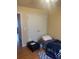 Small bedroom with closet, bed and a view into the hallway at 1719 Low Country Pl. # B, Myrtle Beach, SC 29577