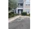 Charming condo entrance with blue and beige siding and well-maintained landscaping at 1719 Low Country Pl. # B, Myrtle Beach, SC 29577