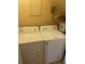 An Amana brand washer and dryer are side by side in this laundry room at 1719 Low Country Pl. # B, Myrtle Beach, SC 29577