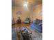Cozy living room featuring hardwood floors, ceiling fan, comfortable seating, and stylish decor at 1719 Low Country Pl. # B, Myrtle Beach, SC 29577