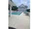 Enjoy the community pool with lounge chairs and tables for relaxing afternoons at 1719 Low Country Pl. # B, Myrtle Beach, SC 29577
