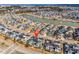 An aerial view showcases the community homes with lake views and manicured landscaping at 1749 Culbertson Ave. # 1749, Myrtle Beach, SC 29577