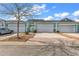 Charming townhome with well-manicured lawns and three car garages and similar pastel facades at 1749 Culbertson Ave. # 1749, Myrtle Beach, SC 29577