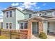 Charming townhome with a brick entryway, light teal siding, black railing and a well-maintained landscape at 1749 Culbertson Ave. # 1749, Myrtle Beach, SC 29577