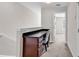 Cozy hallway nook featuring a dark wooden desk and a comfortable upholstered chair at 1749 Culbertson Ave. # 1749, Myrtle Beach, SC 29577