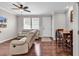 Combined living and dining area with hardwood floors, modern furnishings, and ample natural light at 1749 Culbertson Ave. # 1749, Myrtle Beach, SC 29577
