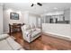 Open-concept living area featuring hardwood floors, neutral paint, and a cozy seating arrangement at 1749 Culbertson Ave. # 1749, Myrtle Beach, SC 29577