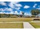 A community park with lush green grass, walking paths, a gazebo, and a water tower in the background at 1749 Culbertson Ave. # 1749, Myrtle Beach, SC 29577