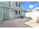 Back patio features an air conditioning unit, a door to the house, and a hose reel at 1749 Culbertson Ave. # 1749, Myrtle Beach, SC 29577
