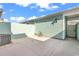 Back patio features an air conditioning unit, a hose reel, and a door to a yard at 1749 Culbertson Ave. # 1749, Myrtle Beach, SC 29577