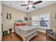 Bright bedroom with large window, ceiling fan, and cozy decor at 2019 Balfour Ct. # L4, Myrtle Beach, SC 29575