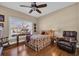 Cozy bedroom with large window, hardwood floors, and ample natural light at 2019 Balfour Ct. # L4, Myrtle Beach, SC 29575