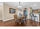 The dining room features a round table and a hutch, with hardwood floors throughout at 2019 Balfour Ct. # L4, Myrtle Beach, SC 29575