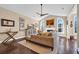 Comfortable living room with neutral tones, fireplace, and large windows at 2019 Balfour Ct. # L4, Myrtle Beach, SC 29575