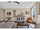 Comfortable living room with neutral tones, fireplace, and large windows at 2019 Balfour Ct. # L4, Myrtle Beach, SC 29575