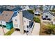 Aerial view of a coastal home with a chimney and a gray roof in a vibrant neighborhood at 206B 56Th Ave. N, North Myrtle Beach, SC 29582