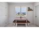 Quaint dining area with a wooden table and benches is bathed in sunlight at 206B 56Th Ave. N, North Myrtle Beach, SC 29582