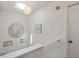 A bright hallway featuring light walls, modern lighting, and a skylight at 206B 56Th Ave. N, North Myrtle Beach, SC 29582