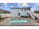 Beautiful backyard featuring a pool, seating, and a well-maintained exterior at 214 2Nd Ave. S, North Myrtle Beach, SC 29582
